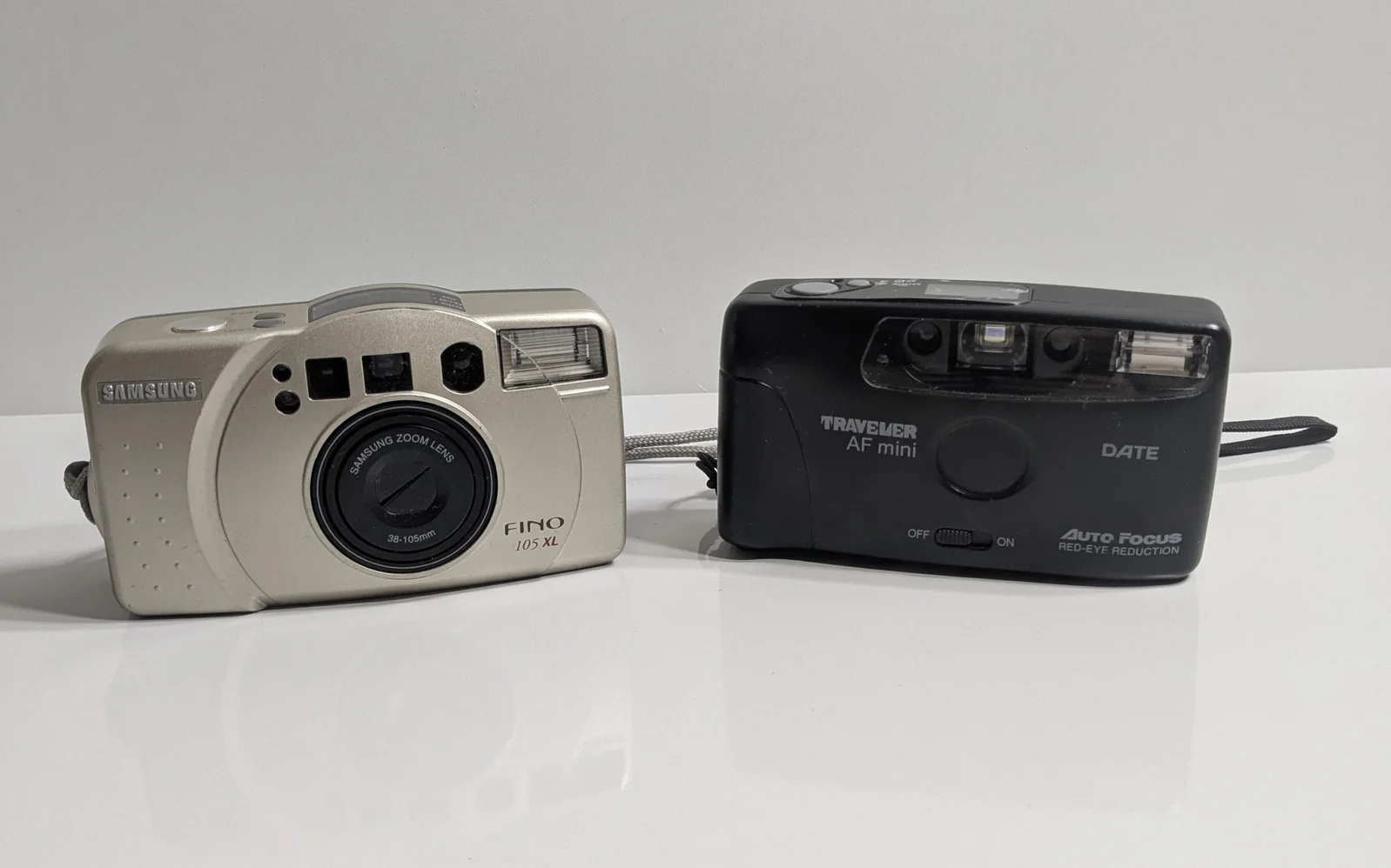 Samsung Fino 105 XL & Traveler AF Mini Date Analogkamera Konvolut
